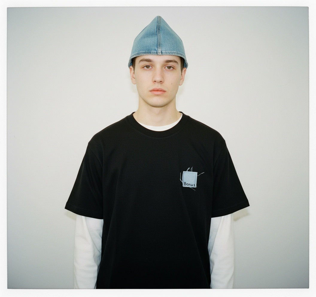 Front view of black streetwear T-shirt by BONUS — premium cotton — denim embroidered detail 