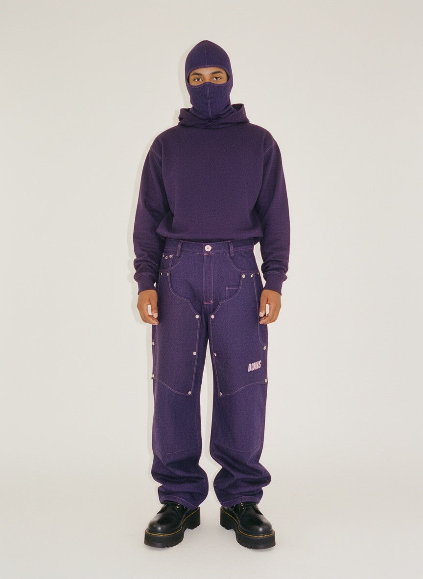 Front view handcrafted denim jeans — premium artisanal streetwear — multifunctional denim pants —  for women and men streetwear.